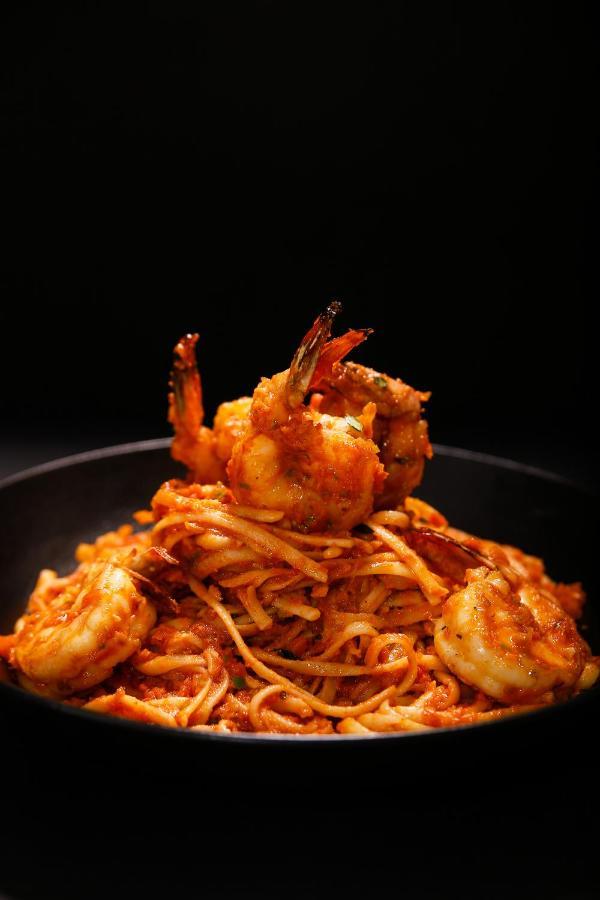Ambiance Boutique Art Hotel Lahore Exteriör bild Shrimp and pasta
